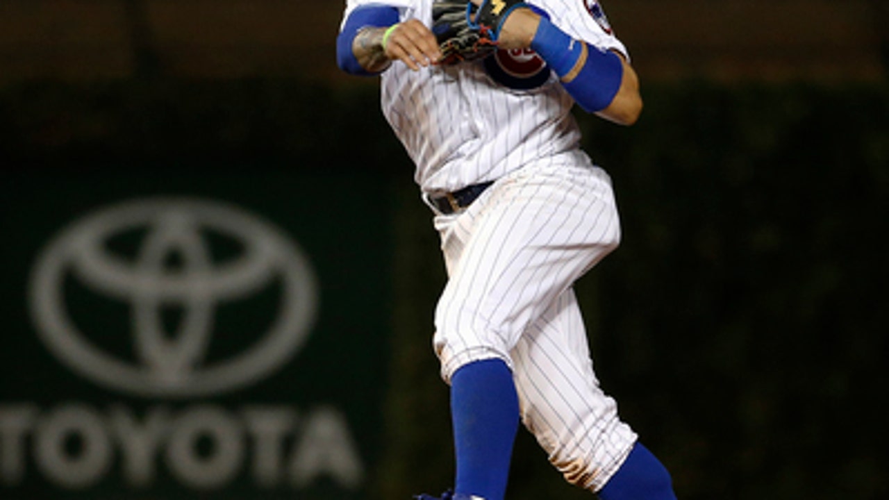 Lester, Baez help Cubs blank Giants 1-0 in NLDS opener
